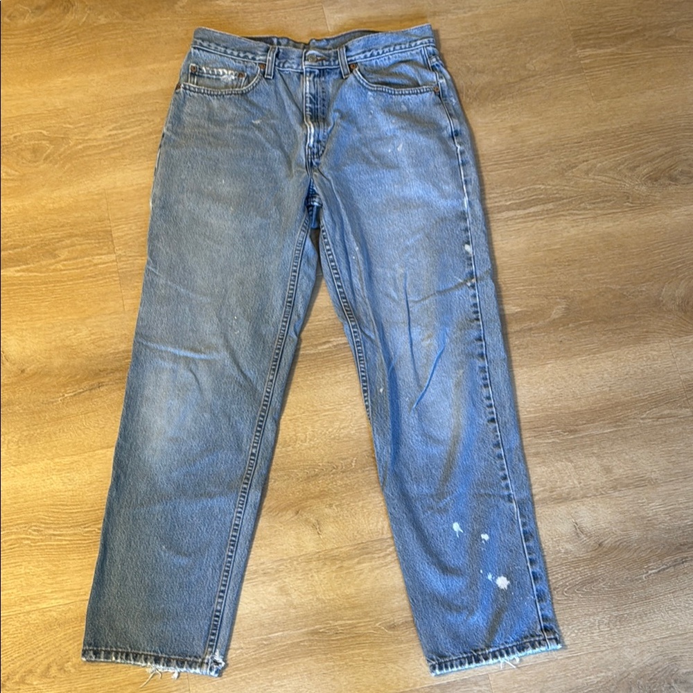 Blue Denim Jeans with Distressed Hem